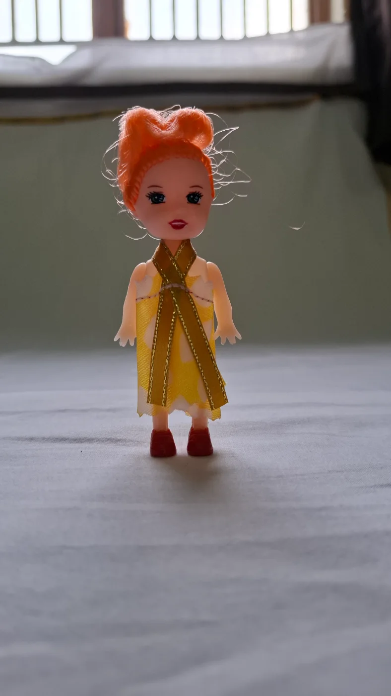 Miniature Girl Doll with Orange Hair and Yellow Dress