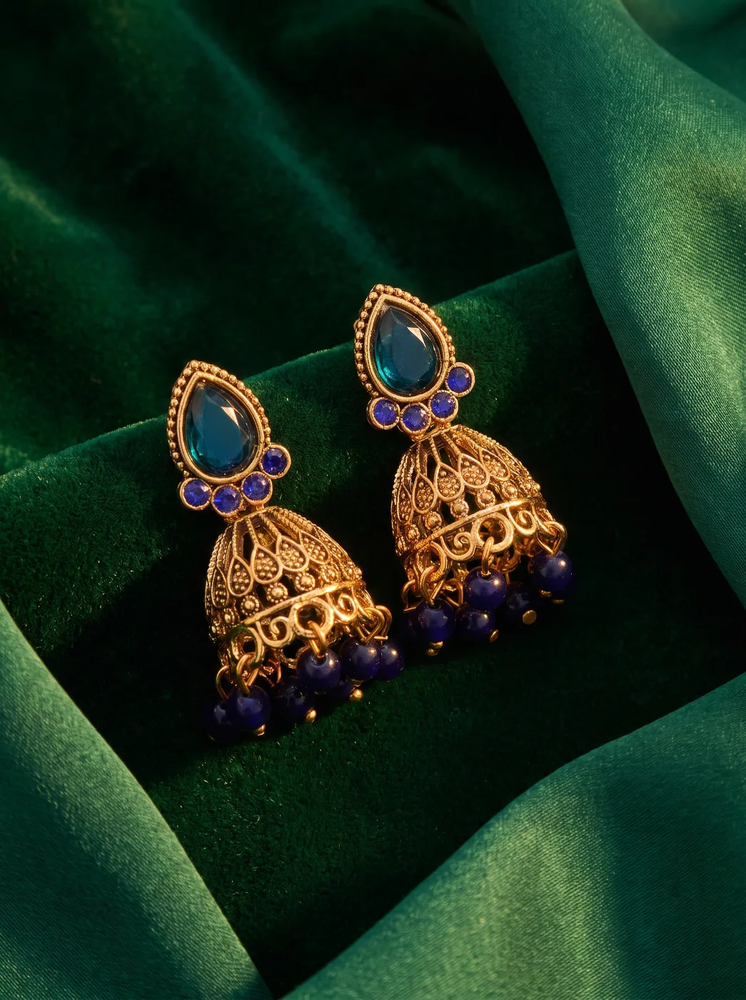 Gold Toned Blue Stone Jhumka Earrings for Women