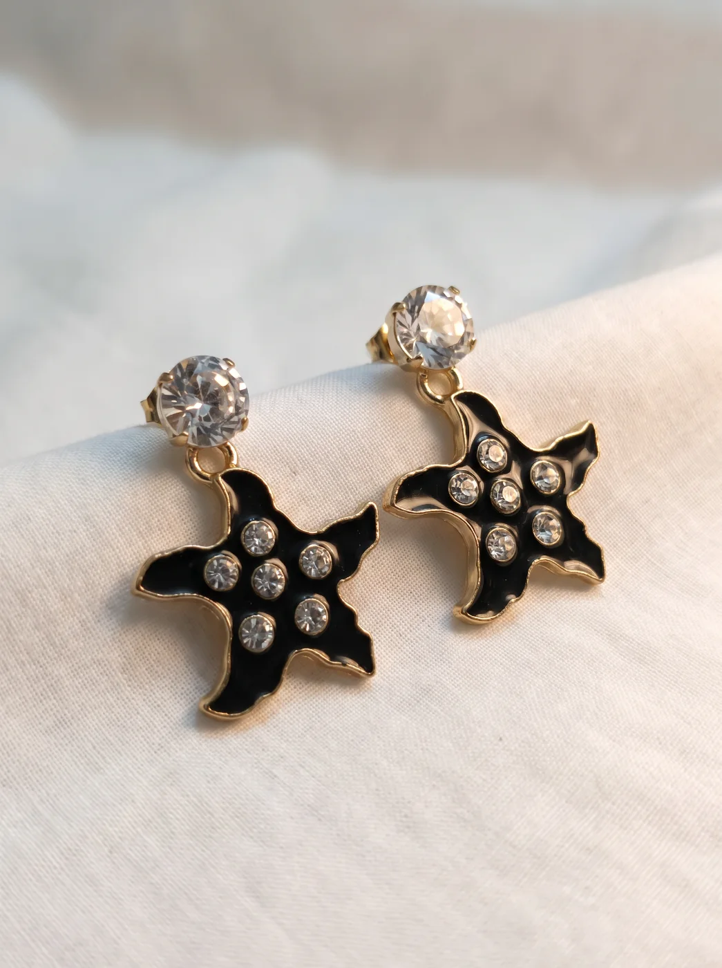 Black Starfish Dangle Earrings with Clear Stones