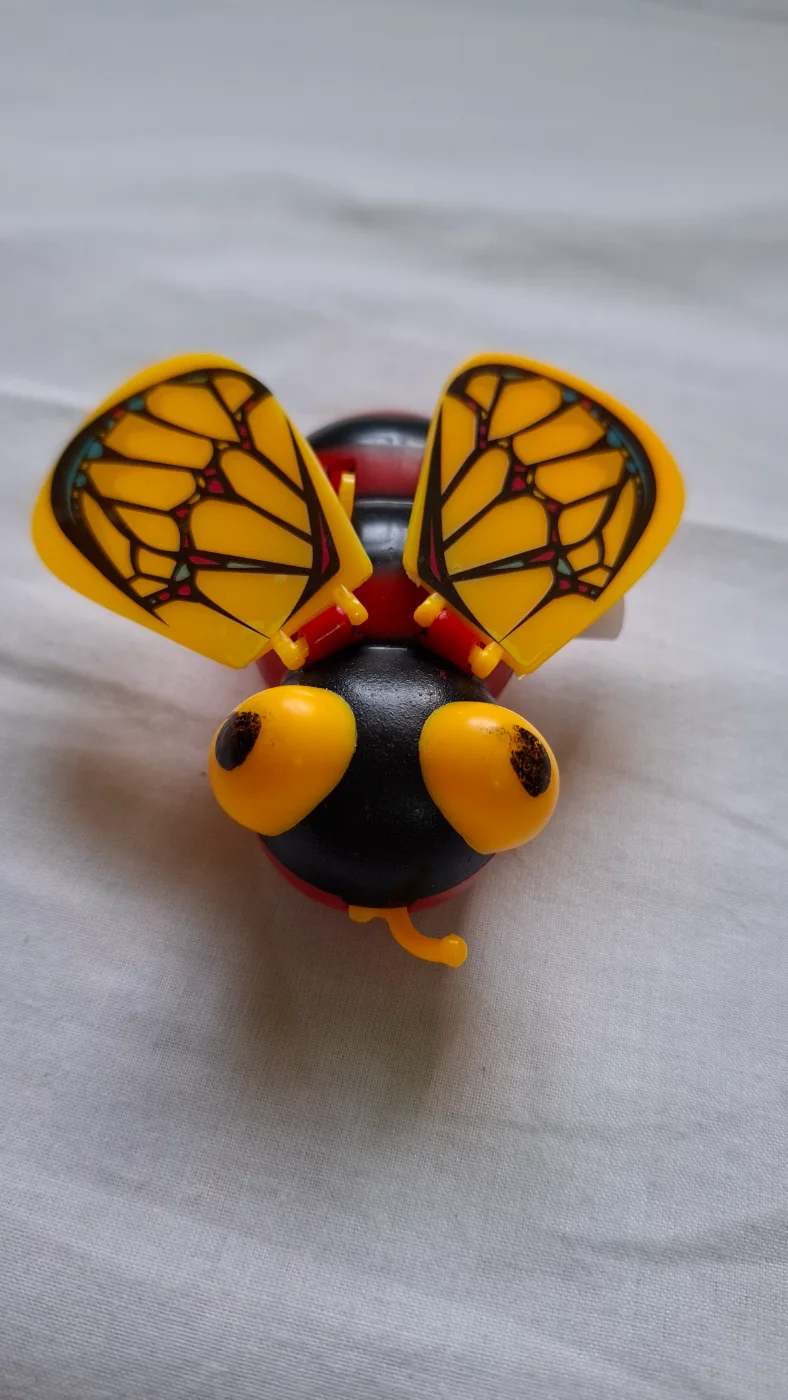 Colorful Insect Toy with Yellow Wings and Eyes for Kids