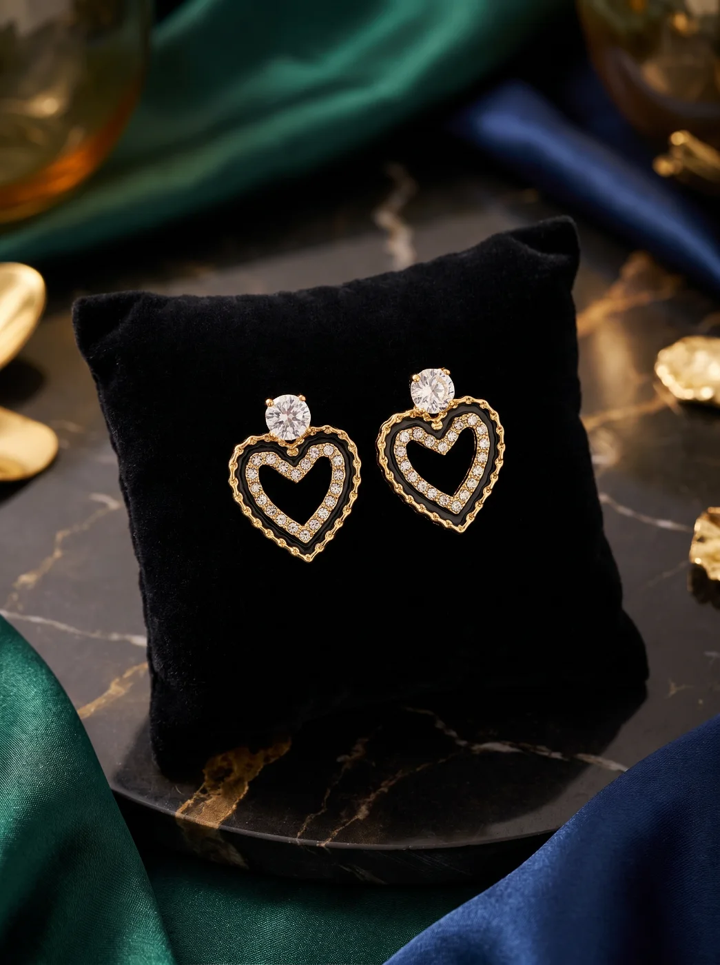 Gold Toned Black Enamel Heart Stud Earrings with Cubic Zirconia