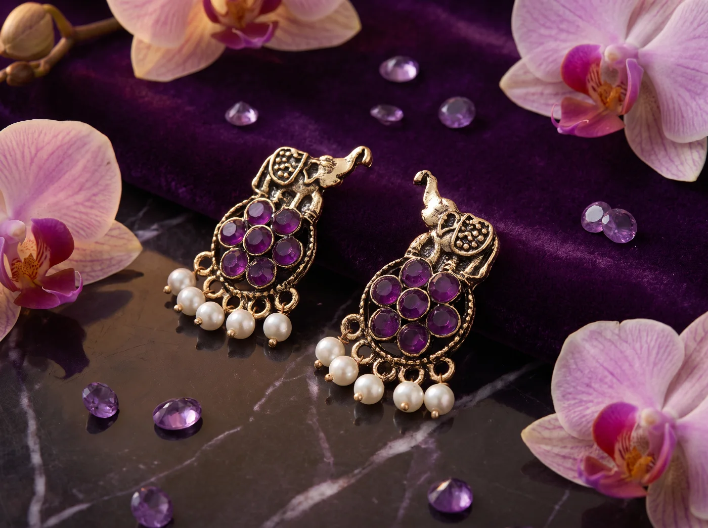 Ethnic Gold Plated Elephant Design Drop Earrings with Purple Stones and Pearl Drops