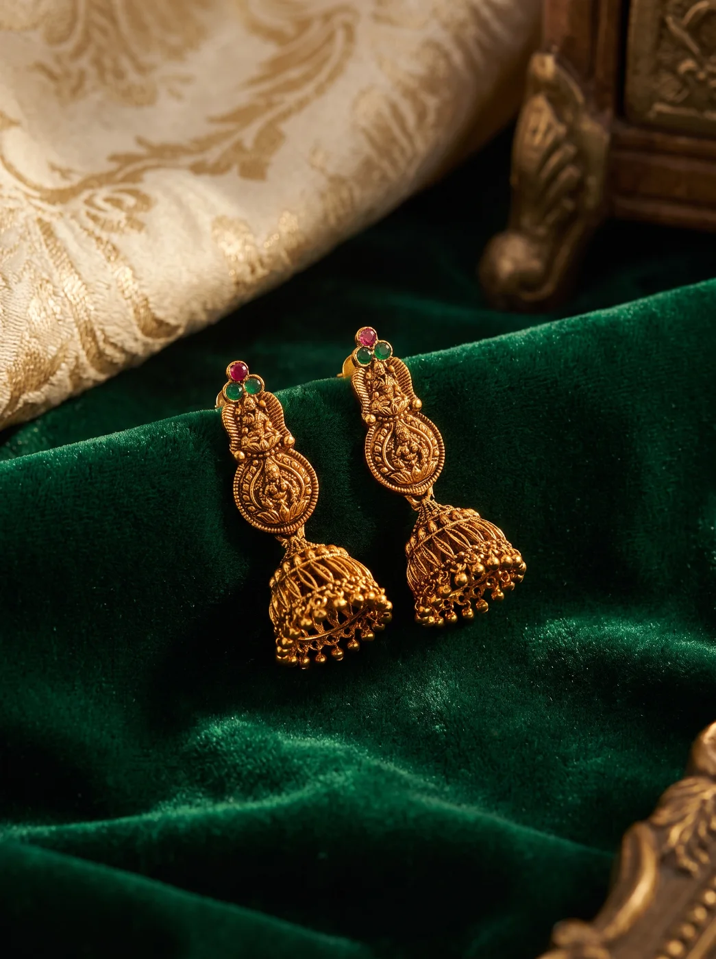 Antique Gold Plated Traditional Jhumka Earrings with Deity Motif