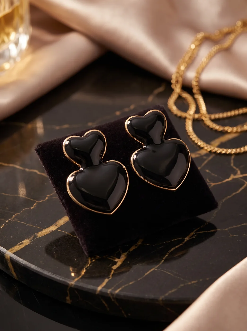 Elegant Black Heart Drop Earrings with Gold Tone Trim for Women