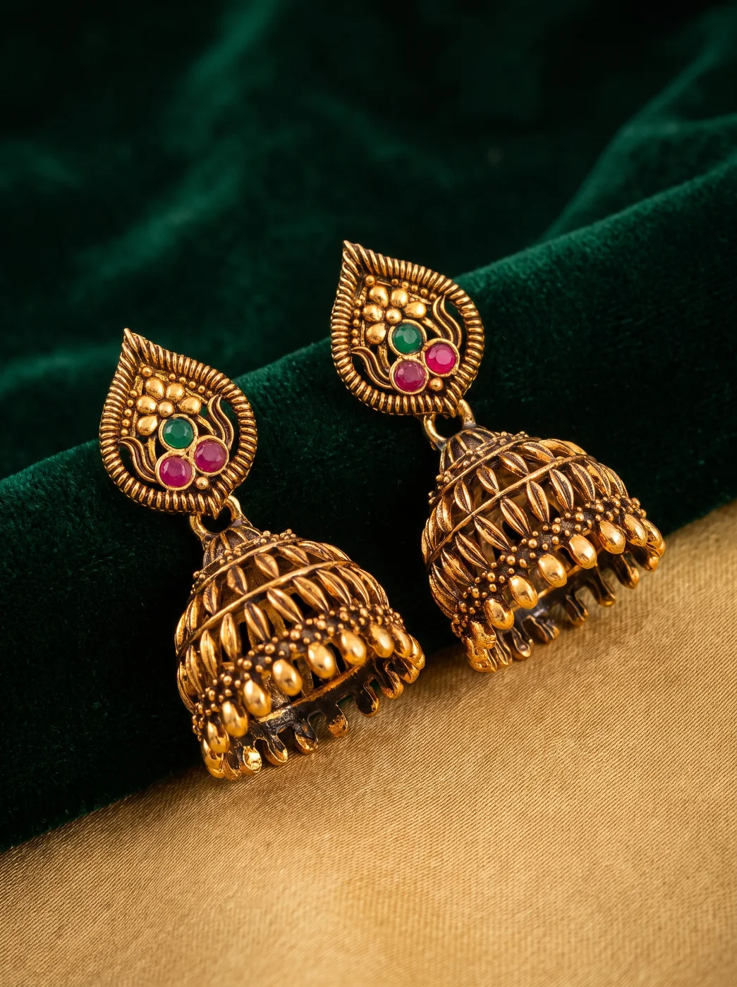 Traditional Gold Toned Jhumka Earrings with Green and Red Stones
